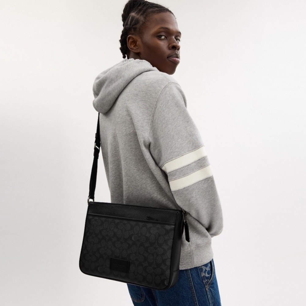 District Crossbody Bag In Signature Canvas